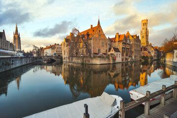 Wall Mural - Bruges skyline with old buildings at sunset in Bruges, Belgium.
