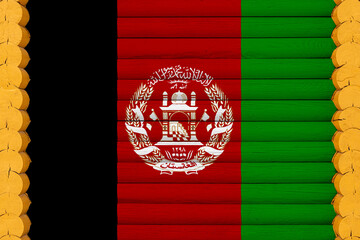 Wall Mural - National flag  of Afghanistan on a wooden wall background. The concept of national pride and a symbol of the country. Flags painted on a house