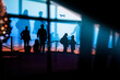 Silhouettes of people waiting in the airport for delayed or cancelled flights because of Corona virus, coming home for Christmas in 2020