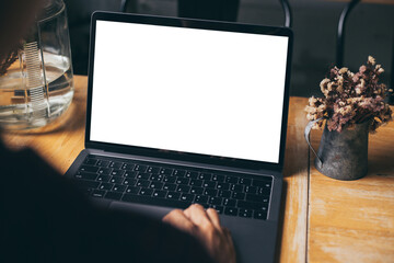 computer screen blank mockup.hand woman work using laptop with white background for advertising,contact business search information on desk at coffee shop.marketing and creative design