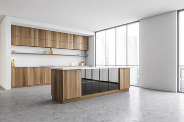 White and wooden kitchen table and kitchen set near window