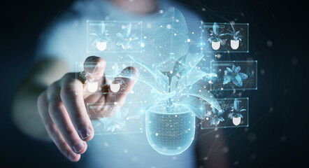Leinwandbilder - Man holding and touching holographic projection of a plant with digital analysis 3D rendering