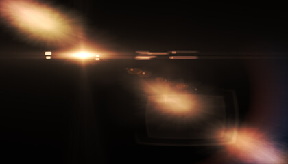 Wall Mural - abstract sun flare and bokeh.abstract burst lens flare light over black background