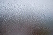 © 8H - Rain drops on windows glass background