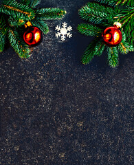 Wall Mural - Dark Christmas background with festive decoration. Copy space. Flat lay. Top view