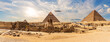 The Great Pyramids of Giza and The Sphinx near the ruins of a temple in Giza, Egypt
