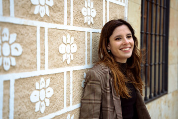 portrait of a woman in flowerish wall