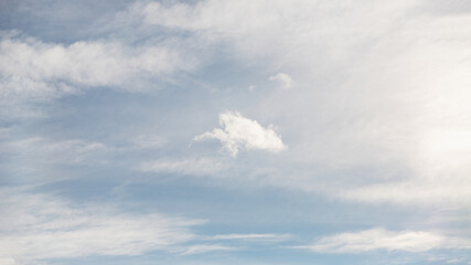 Wall Mural - Cirrocumulus clouds in the pale blue sky background