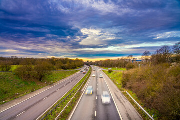 Canvas Print - Blurry cars on A1M motorwayy in England at sunset