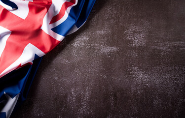 Wall Mural - Happy Australia day concept. Australian flag against old stone background. 26 January.