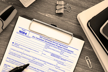Business concept meaning Form 15230-B IRS Continuing Service Agreement (for Candidate Development Program Participants) with phrase on the page.