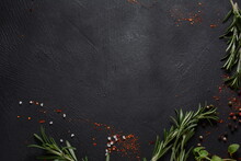 Spices And Herbs On Dark Stone Background