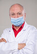 © vbaleha - Portrait of doctor wearing protective mask  indoors