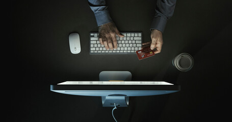 Poster - Businessman doing online shopping with a credit card