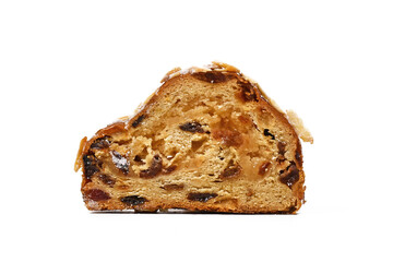 Sticker - Slice of German Stollen cake, a fruit bread with nuts, spices, and dried or candied fruits with powdered sugar traditionally served during Christmas time isolated on white background