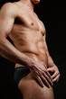 © vladorlov - Fashion portrait of strong brutal guy with a modern trendy hairstyle. Sexy torso. Male flexing his muscles. Sport workout bodybuilding.
