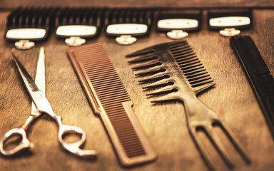 Canvas Print - combs and scissors for haircuts lie on a shelf in the cabin