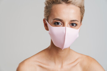 Close up of a woman wearing safety medical mask