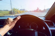 © itthiphon - Driving a car in Thailand runs a lane on the left.