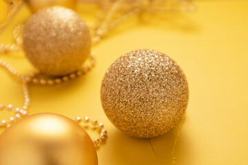 Christmas yellow decorations a on Illuminating colored background.