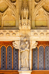 Poster - Madonna with a child as statue at a cathedral