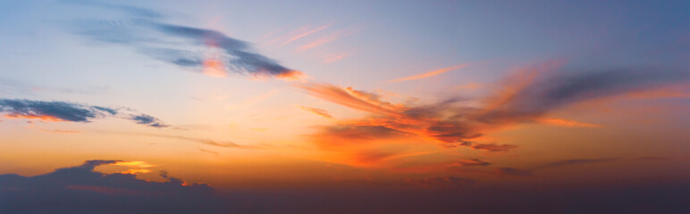 Wall Mural - panoramic fluffy clouds in the twighligth sky