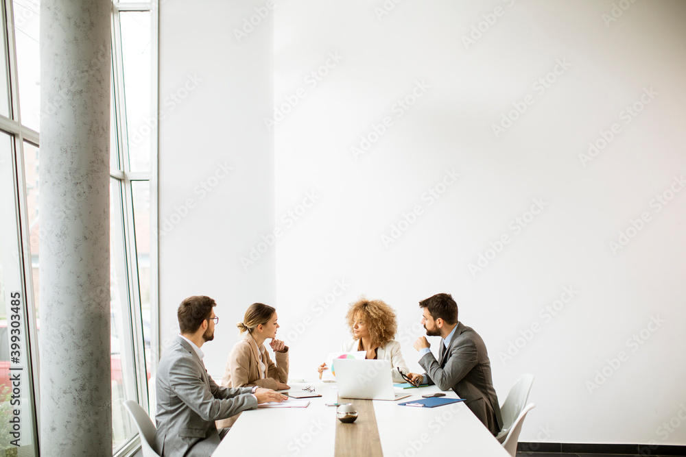 Multiethnic business people working together in the office - obrazy, fototapety, plakaty 