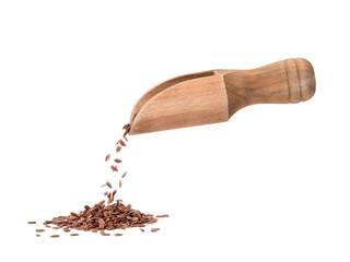 Wall Mural - Side view of linseed or flax seed falling from a wooden scoop to a small pile and isolated on white background