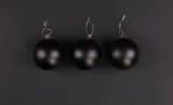 Fototapeta Mapy - black christmas balls isolated on black background