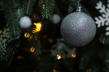 Wall Mural - Beautiful Christmas Decorations Hanging On A Christmas Tree. 