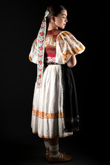 Wall Mural - Slovak folklore. Slovakian folklore girl. Beuatiful young girl in slovak folk dress
