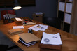 © New Africa - Typewriter, fingerprints and papers on desk in office. Detective's workplace