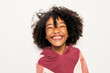 © Santi Nunez/Stocksy - Black kid in studio smiling.
