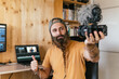 © KIKE ARNAIZ/Stocksy - Man talking to the camera