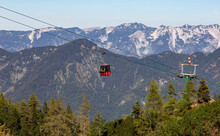 Austria, Upper Austria, Bad Ischl, Overhead Cable Car Moving Over Forested Mountain Valley