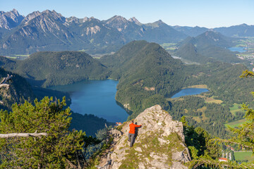 Canvas Print - Tourist overlooking beautiful landscape of Schwangau. Southwest Bavaria. Germany 