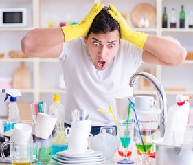 The man frustrated at having to wash dishes