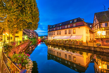 Wall Mural - Old town water canal of Strasbourg, Alsace, France. Traditional half timbered houses of Petite France