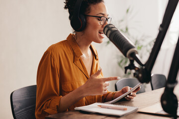 Wall Mural - Radio host working from home