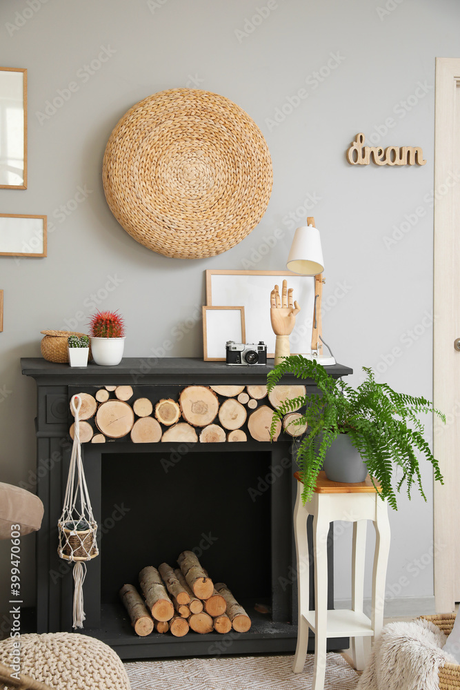 Stylish interior of room with fireplace