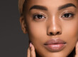 © Utkamandarinka - African american woman looking camera face close up beauty skin
