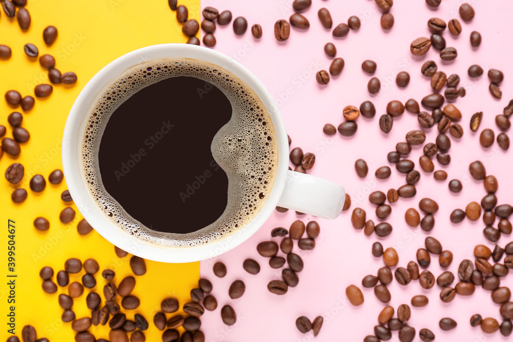 Cup of coffee and beans on color background
