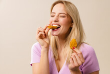 Cheerful Beautiful Girl Laughing While Eating Nuggets On Camera