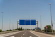 Spanish highway with traffic signs and clear sky