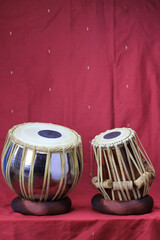 Wall Mural - Indian tabla drums on a red background