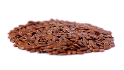 Wall Mural - Close-up of flax seeds isolated on white background