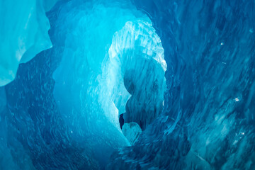 exploring the blue ice cave during the tasman glacier heli hike tour in mt cook national park of new