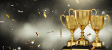 Close Up Golden Trophy Award With Falling Confetti. Copy Space For Text. 3d Rendering.	
