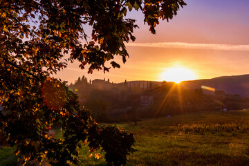 Wall Mural - sunset over the Chianti hills of Siena in Tuscany in autumn