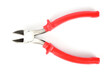 Nippers with red plastic handles isolated on white